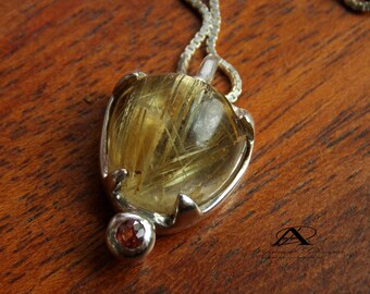 Pendentif en quartz avec ver à cheveux, argent sterling, saphir rouge
