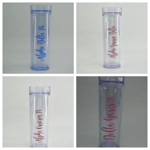 May include: Four clear plastic tumblers with lids and straws. Each tumbler has a different sorority name printed on it in a cursive font. The names are Alpha Delta Pi, Alpha Gamma Delta, Alpha Omicron Pi, and Delta Gamma.