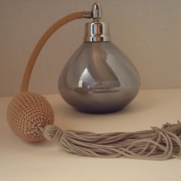 Pearl grey Irice perfume bottle with atomizer