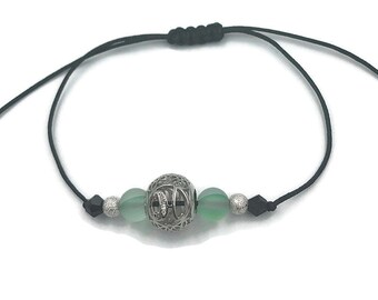 Green and silver Hills memorial bracelet with H bead