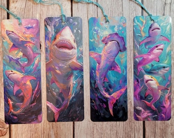 May include: Set of four colorful bookmarks featuring different shark species. Each bookmark has a unique design with vibrant colors and intricate details. The bookmarks are perfect for book lovers and shark enthusiasts.