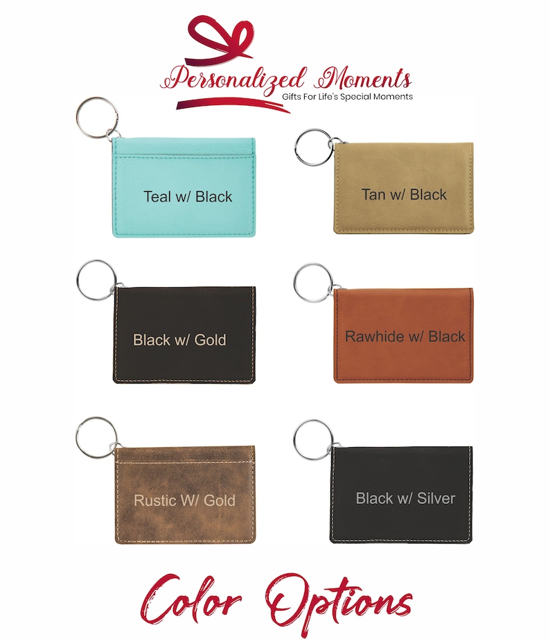 May include: Six different color options for a leather key chain card holder. The options are teal with black, tan with black, black with gold, rawhide with black, rustic with gold, and black with silver.