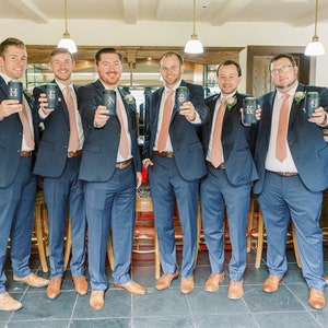 Groomsman Holding Custom Beer Can Coolers