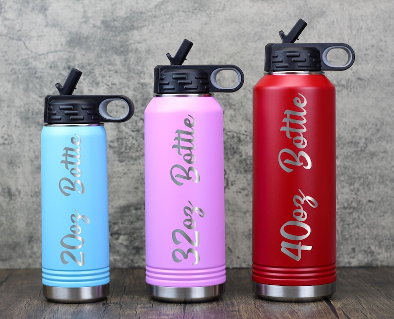 20oz light blue, 32oz light purple and 40oz red water bottles showing the sizes.