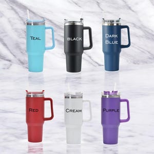 May include: Six insulated tumblers in teal, black, dark blue, red, cream, and purple. Each tumbler has a handle, a lid, and a straw. The color of each tumbler is labeled in black text.