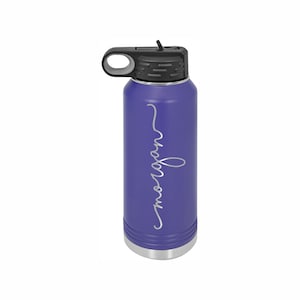 Purple Water Bottle with straw custom made with the name Morgan in shoreline font.