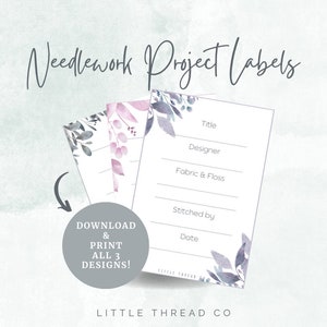 May include: Three printable needlework project labels with watercolor floral designs in shades of pink, blue, and gray. The labels include fields for title, designer, fabric and floss, stitched by, and date.
