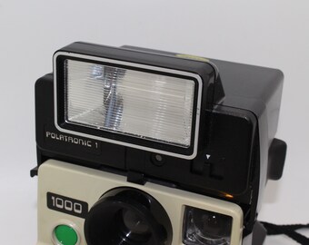 one step polaroid land camera flash bar