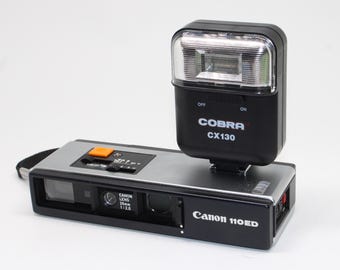 1975 Canon 110ED Film Camera with rangefinder, case, flash and new film - Tested