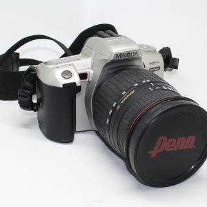 Minolta Dynax 404si 35mm Film Camera w/ Sigma 28-300mm Lens
