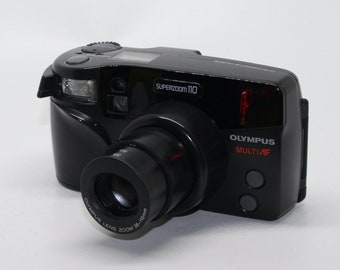 Olympus Superzoom 110 Multi AF 35mm Film Compact Camera with retail box and manual – Tested and very good condition