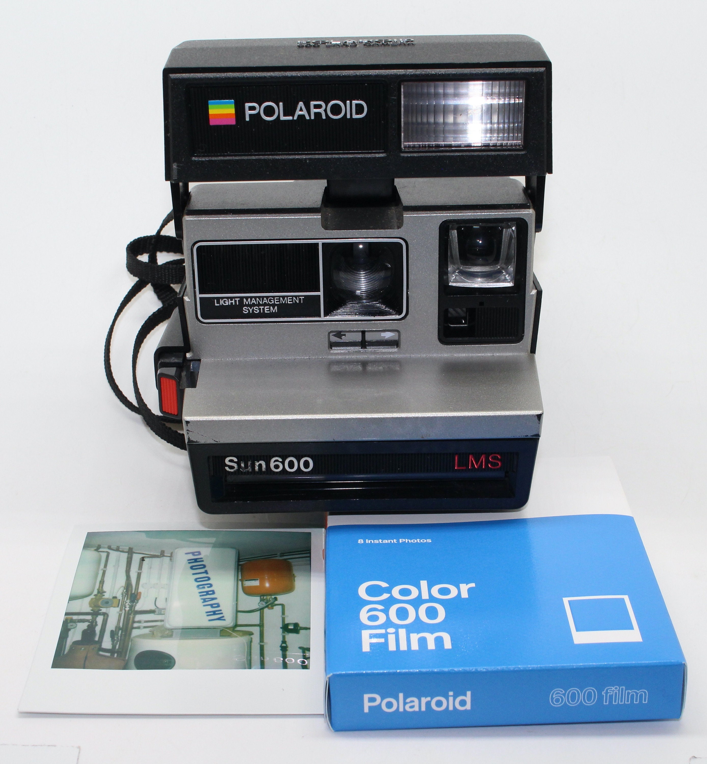 Polaroid Sun 600 LMS Instant Camera With Brand-new Polaroid pic