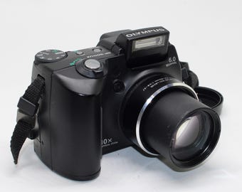 2005 Olympus SP-500UZ 6MP Digital Camera with strap, batteries and card - Tested