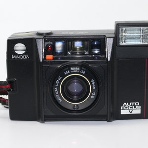 Minolta AF-Sv 35mm Film Camera (1984) with Case & Manual