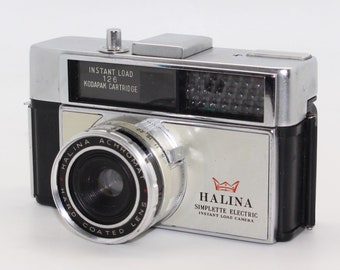 Halina Simplette Electric 126 Film Cartridge Camera + case – c. 1970 – with working winder and meter - Lomography