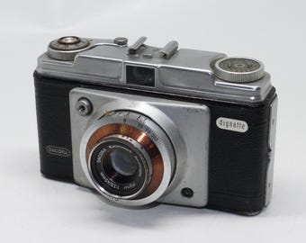 Cámara con visor Dacora Dignette de 35 mm y estuche, c.1958. Buen estado y probada.