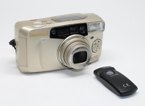 1999 Samsung Vega 140S Quartz Date 35mm Film Camera with remote - Tested