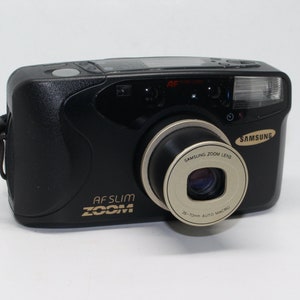 Samsung AF-Slim Zoom Date 35mm Film Compact Camera with 35-70mm zoom lens with case - Very good condition and tested