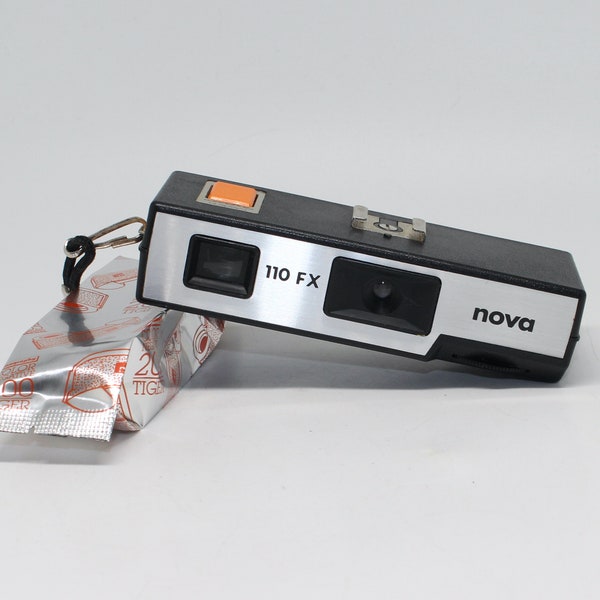 Nova 110 FX Film Camera with wrist-strap and new Lomography film  – Very good condition and tested