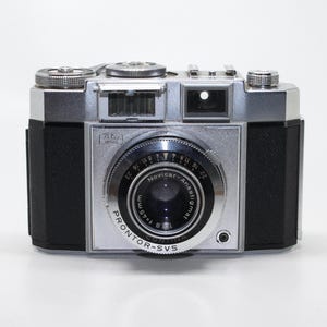 Zeiss Ikon Contina II 527/24 35mm Film Camera with its original case and working light meter - Very good condition c.1956-58