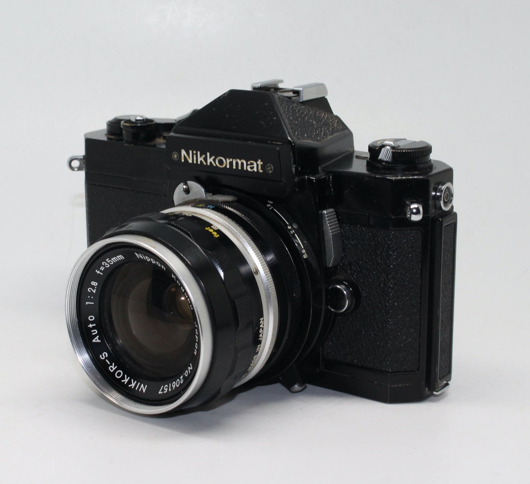 Nikkormat FT2 35mm Film SLR Camera With Nippon Kogaku Nikkors Auto 12