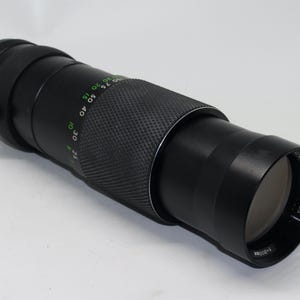 Optomax 300mm f5.5 M42 Lens: Retro Telephoto with Case