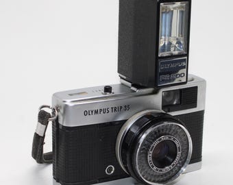 Vintage Olympus Trip 35 35mm Vintage Camera with PS200 Flash, new seals and manuals