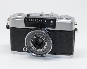 1973 Olympus Pen EE-3 Half-Frame 35mm Film Camera with case, strap and flash – Tested