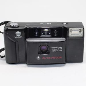 1984 Minolta AF-E 35mm Film Camera: Retro Classic, Tested w/ Case