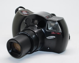 1994 Samsung ECX 1 35mm film camera with retail box - Porsche Design - Tested