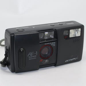 OLYMPUSフィルムカメラ AF-1 SUPER QUARTZ DATE Olympus AF-1 Super | 35mm Film Camera | The 35mm Club