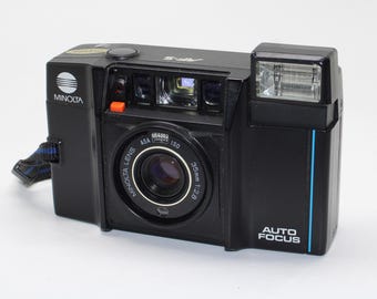 1984 Minolta AF-S Auto-focus 35mm Film Camera with case and lens cover - Tested