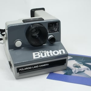 Polaroid The Button Instant Land Camera - Uses modern Polaroid SX-70 film - Tested and very good condition