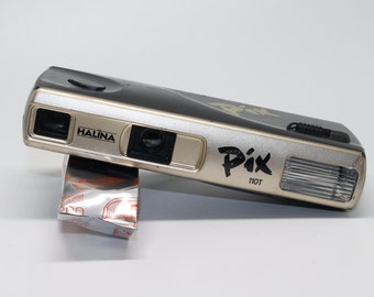 Halina Pix 110T Sub Mini Film Camera, Wrist-strap, Case and New