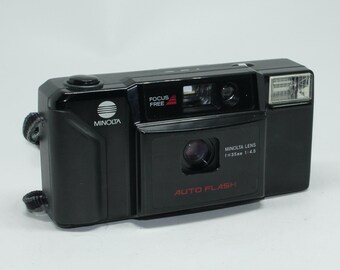 Fotocamera vintage Minolta FS-E 35 mm - Con custodia e manuale - Testata e funzionante