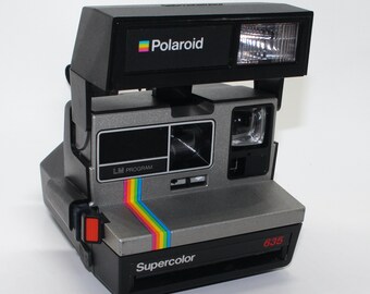Polaroid Supercolor 635 Instant Camera with pack of new Polaroid 600 Film and carry case - Very good condition & tested c. 1970s