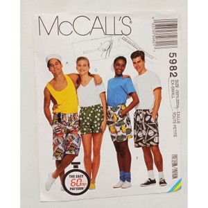May include: A sewing pattern for shorts, featuring four models wearing different patterned shorts. The pattern is McCall's 5982, size 32-33 1/2, for petite sizes. The pattern is labeled "The Easy 60 min Pattern".