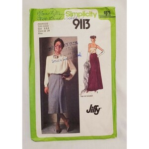 May include: Simplicity sewing pattern number 9113 for a skirt. The pattern includes two sizes, 6 and 8, with a waist measurement of 23 to 24 inches. The pattern is for misses and includes instructions for a skirt with a wrap-around design.