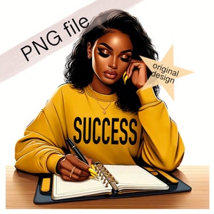 May include: A woman with dark curly hair is sitting at a desk, wearing a yellow sweatshirt with the word "SUCCESS" printed on it. She is writing in a yellow and gold notebook with a gold pen.