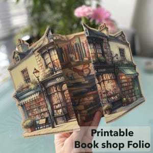 May include: Printable book shop folio featuring a detailed illustration of a charming, old-fashioned bookstore with a whimsical, vintage aesthetic. The folio is made of sturdy cardstock and features a pop-up design.
