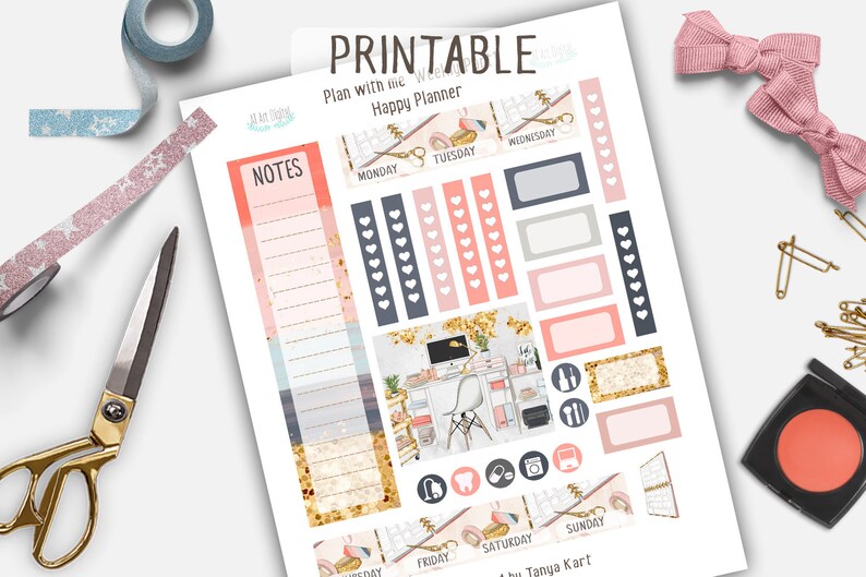 May include: Printable planner stickers with a pink, gold, and blue color scheme. The stickers feature a variety of designs, including hearts, a desk with a computer, and a flamingo. The text "Plan with the Happy Planner" is at the top of the sheet.