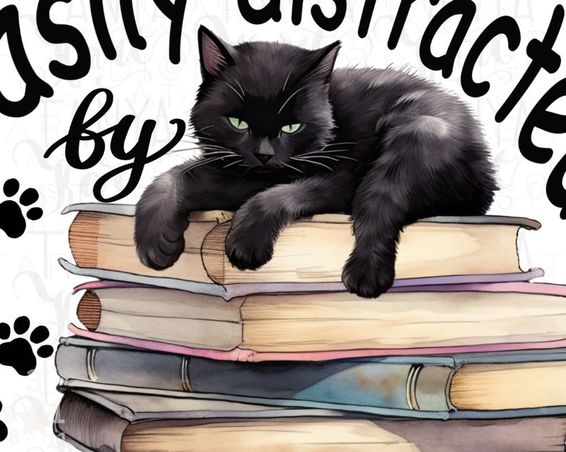 May include: A black cat with green eyes is lying on a stack of books. The text "easily distracted by" is written above the cat and the text "books" is written below the cat.