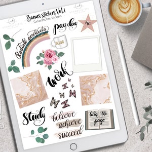 May include: A digital tablet displaying a collection of digital stickers with motivational phrases, floral elements, and butterfly graphics. The stickers include phrases like "Radiate Positivity," "Work," and "Believe, Achieve, Succeed."