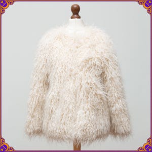 Shaggy cream faux mongolian tibetan fur vegan coat. Glamorous Studio 54 vibes. Disco 70s coat. Retro faux mongolian lamb fur coat. Size S/M