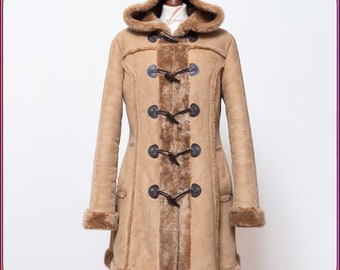 70年代風のシャギーフェイクファーヴィーガンコート。ヴィンテージで