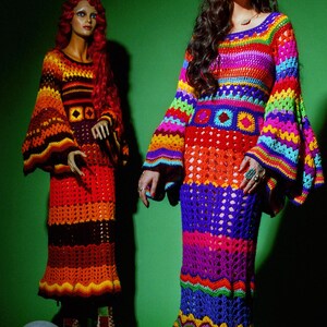 May include: Two women's crochet dresses in vibrant rainbow colors. One dress is on a mannequin, the other is worn by a person. The dresses have bell sleeves and a long, flowing skirt. The background is a solid green.
