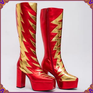 Absolutely incredible Ziggy Stardust 70s style glam rock mega platform boots. Rock Star metallic gold lightning knee high boots. Size US 10