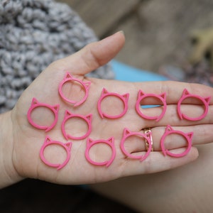 10-pack gehaakte felroze kattensteekmarkeringen, 3D-geprinte jumbo plastic kattenoorsteekmarkeringen, haakcadeau, kousvuller