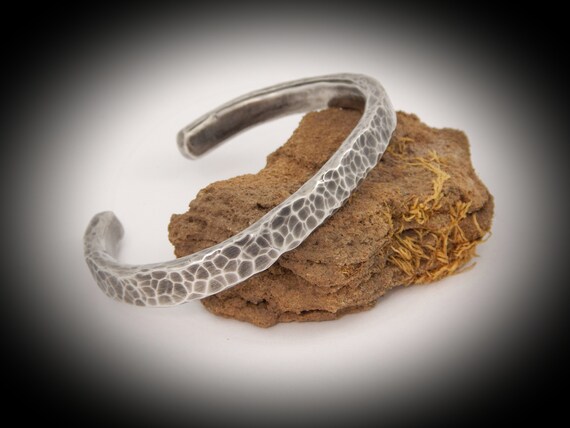 Man bracelet made entirely by hand patinated in unleaded tin
