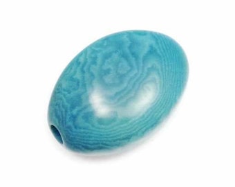 Tagua Perle oval türkis 36mm 1 Stück